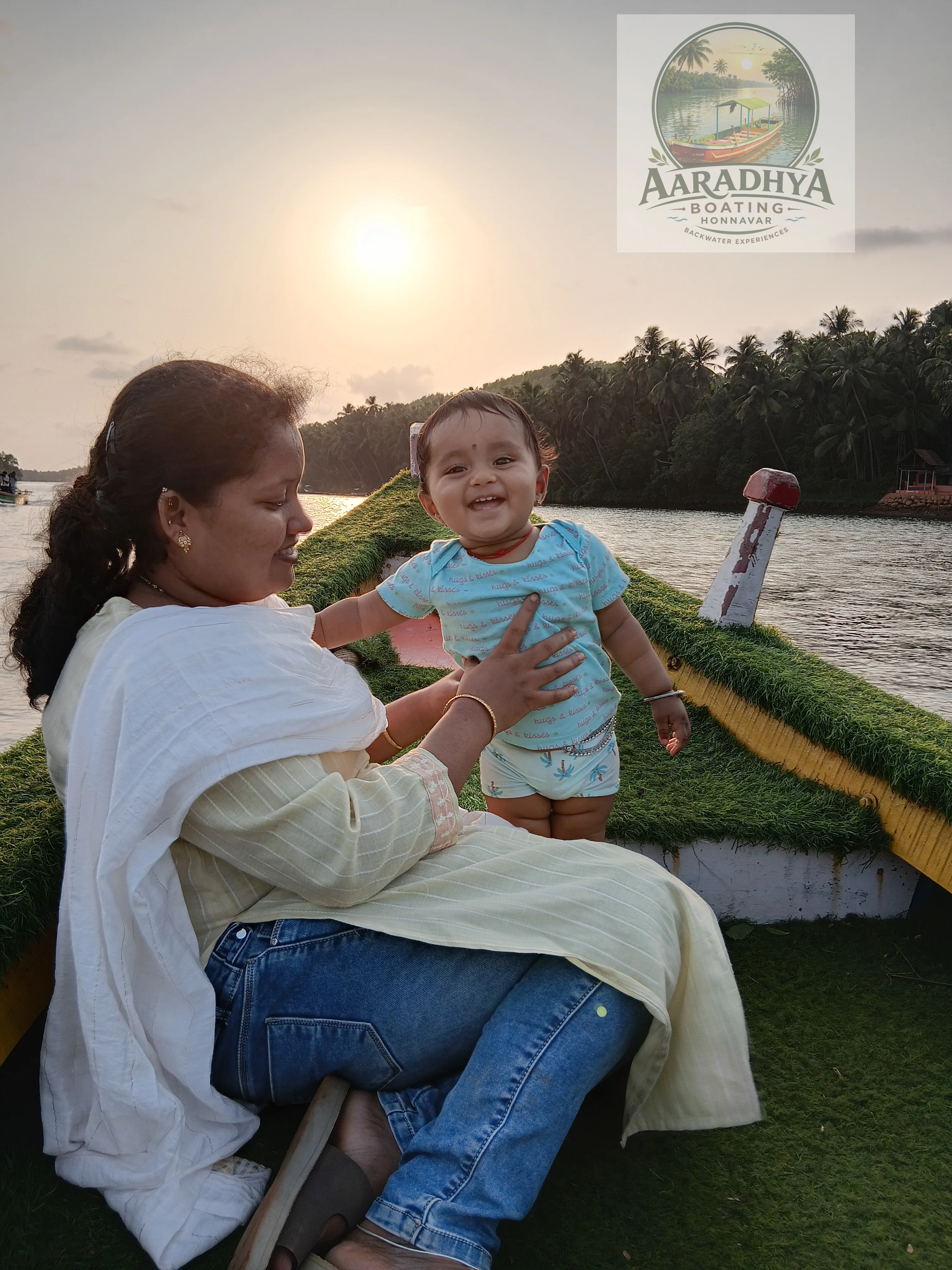 Couple enjoying sunset boating in Honnavar backwaters